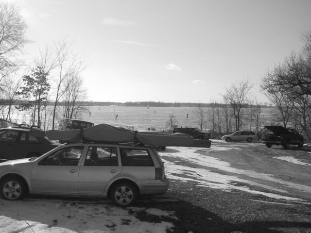 ice surfers on swede lake, minnesota