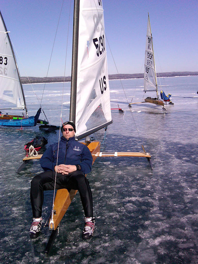 Patrick Huttner (US-5290) relaxes waiting for the wind Friday