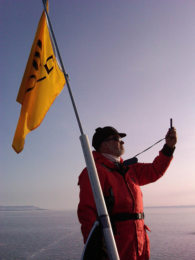 Eric Lind checks the wind one last time Friday evening...